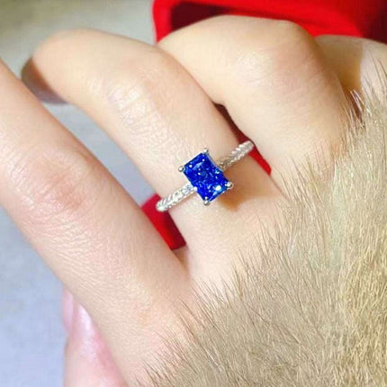 Blue Sapphire Moissanite Ring with Lab Created Diamond in Sterling Silver