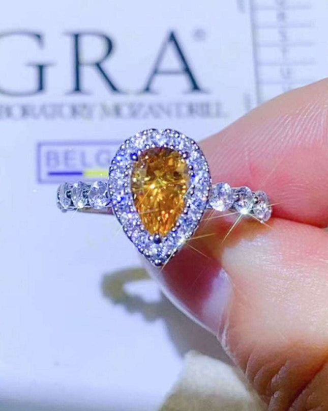 Timeless Teardrop Moissanite Ring with Sparkling Zircon Accents - A Blend of Elegance and Craftsmanship