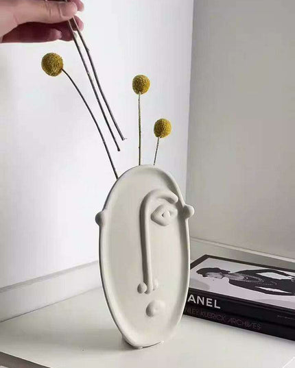 Abstract Beauty: Handcrafted Porcelain Vase with Geometric Charm