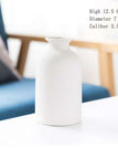 중간 원형 병 흰색