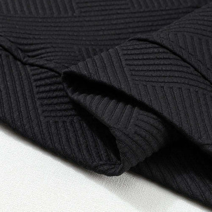 Sophisticated Black Textured Lounge Set with Long Sleeve Top and Adjustable Shorts