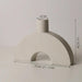 Abstract Ceramic Vase with Elegant Twisted Tube Shape