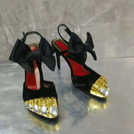 Chic Black High-Heeled Mules with Gold Highlights and Butterfly Bow Accent