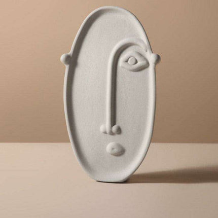 Abstract Beauty: Handcrafted Porcelain Vase with Geometric Charm..