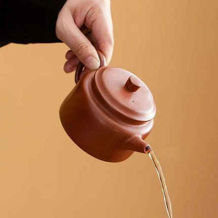 Authentic Artisan Yixing Purple Clay Teapot with Built-In Strainer for a Premium Puer Tea Experience - Très Elite