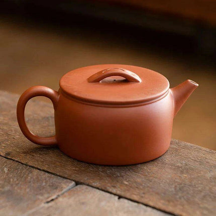 Authentic Artisan Yixing Purple Clay Teapot with Built-In Strainer for a Premium Puer Tea Experience - Très Elite