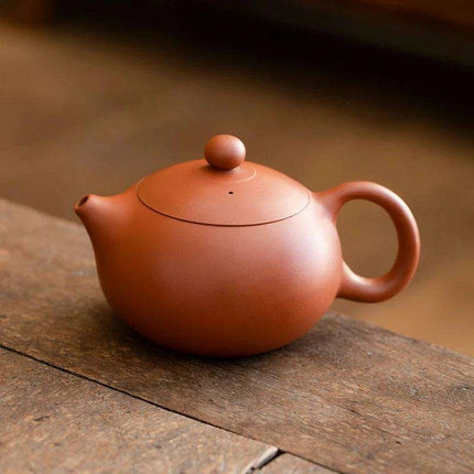 Authentic Artisan Yixing Purple Clay Teapot with Built-In Strainer for a Premium Puer Tea Experience - Très Elite