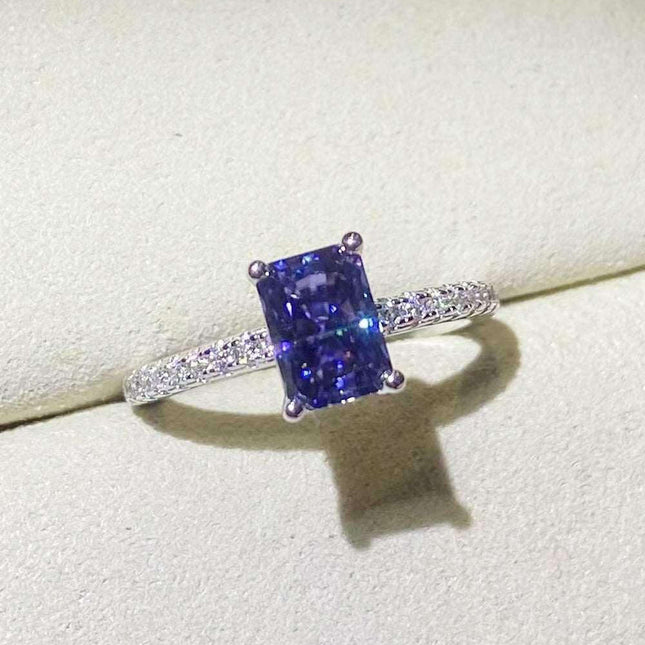 Blue Sapphire Moissanite Ring with Lab Created Diamond in Sterling Silver