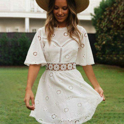 Bohemian Chic Backless Fringed Dress with Elegant Lotus Sleeves for Fashion-Forward Women - Très Elite