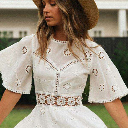 Bohemian Chic Backless Fringed Dress with Elegant Lotus Sleeves for Fashion-Forward Women - Très Elite