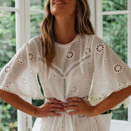 Bohemian Chic Backless Fringed Dress with Elegant Lotus Sleeves for Fashion-Forward Women - Très Elite