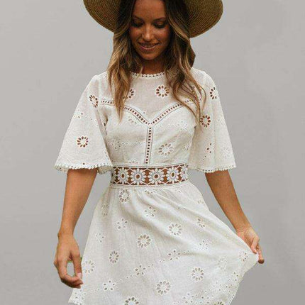 Bohemian Chic Backless Fringed Dress with Elegant Lotus Sleeves for Fashion-Forward Women