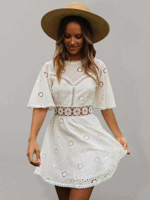 Bohemian Chic Backless Fringed Dress with Elegant Lotus Sleeves for Fashion-Forward Women