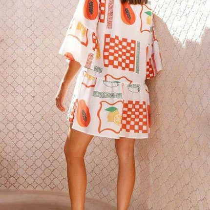 Bohemian-Inspired Midi Dress with Trumpet Sleeves - Très Elite