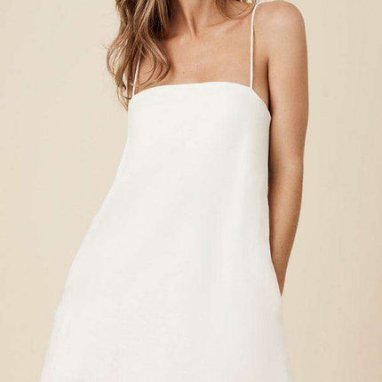 Carefree Getaway Glam: Breezy Cotton Linen Suspender Dress for Effortless Travel Style - Très Elite
