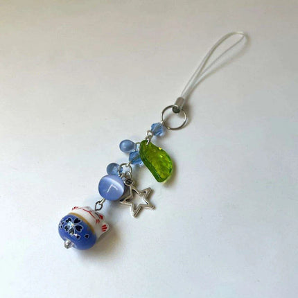 Charming Blue Cat Guardian Phone Accessory | Artisan Keychain with Leaf Detail - Très Elite