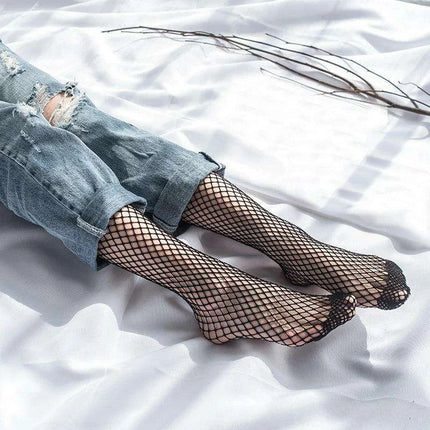 Chic Black Fishnet Long Tube Socks - Essential Summer Fashion Accessory for Women - Très Elite