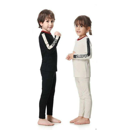Chic Black and Beige Striped Family Matching Modal Outfit Set for All Ages - Très Elite