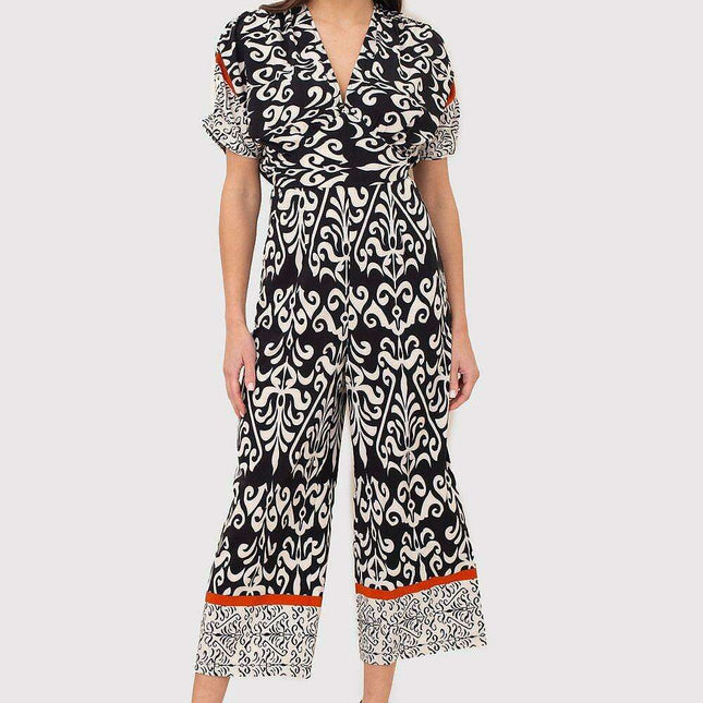 Chic Black and Cream Jumpsuit with Trendy Scoop Neck and Stylish Tie Back