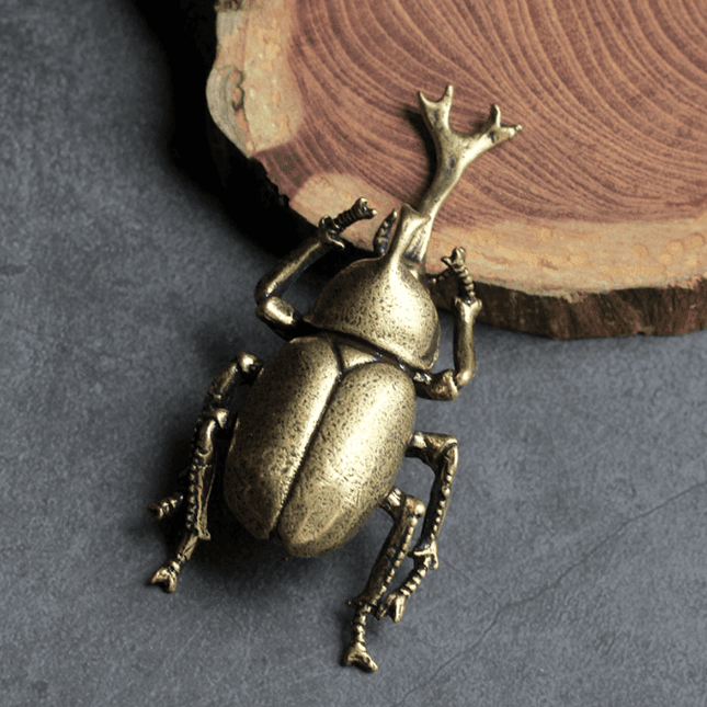 Chic Brass Beetle Accent for a Stylish Workspace Upgrade
