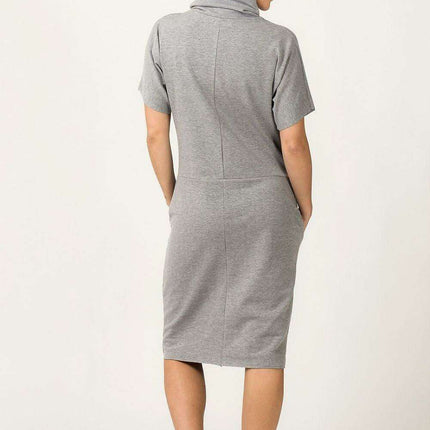 Chic Knit Turtleneck Dress with Functional Pockets - Très Elite