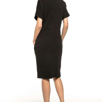 Chic Knit Turtleneck Dress with Functional Pockets - Très Elite