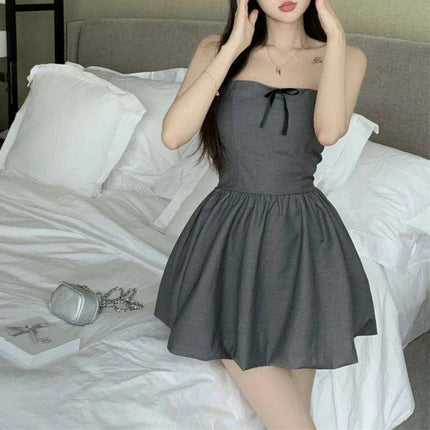 Chic Off-Shoulder Pleated Mini Dress with Elegant Bow Detail - Essential for Summer 2024 Korean Casual Parties - Très Elite