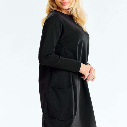 Chic Relaxed Midi Dress with Convenient Pockets - Très Elite