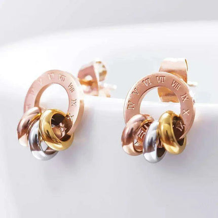 Chic Rose Gold Stainless Steel Stud Earrings with Roman Numeral Design - A Timeless Gift for Her - Très Elite