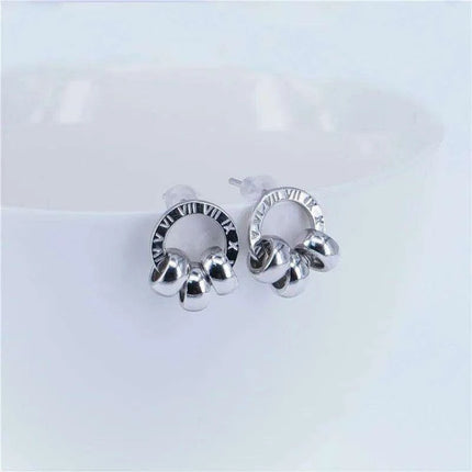 Chic Rose Gold Stainless Steel Stud Earrings with Roman Numeral Design - A Timeless Gift for Her - Très Elite
