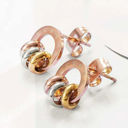 Chic Rose Gold Stainless Steel Stud Earrings with Roman Numeral Design - A Timeless Gift for Her - Très Elite