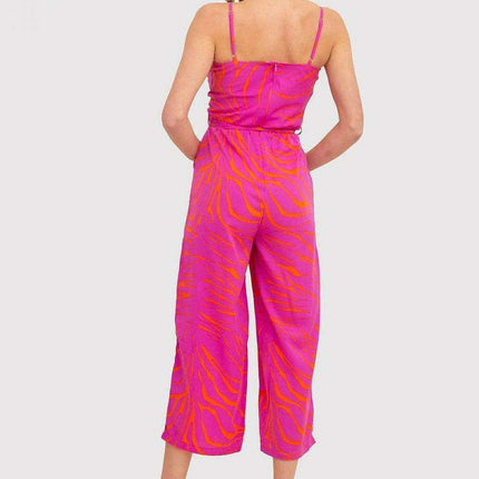 Chic Strapless Jumpsuit with Envelope Top in Vibrant Pink and Orange Print