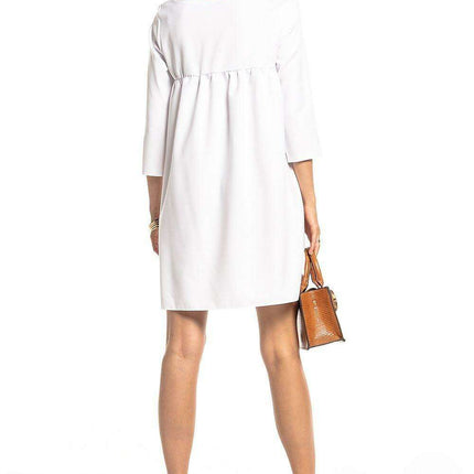 Chic Tessita Daydress: Stylish Pleated Design with Practical Pockets - Très Elite