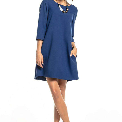 Chic Tessita Daydress: Stylish Pleated Design with Practical Pockets - Très Elite
