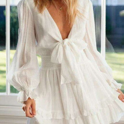 Chic V-Neck Ruffle Knot Mini Dress for Trendsetting Ladies - Très Elite