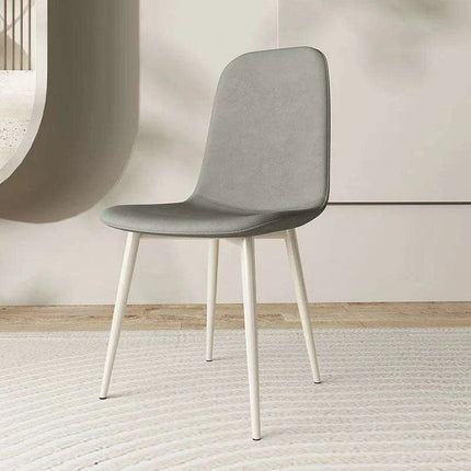 Chic White Leather Dining Chair for Upscale Aesthetics..