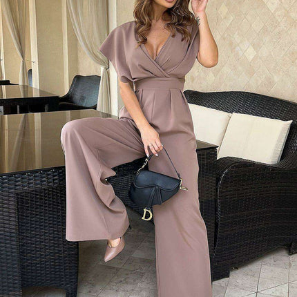 Chic Wide-Leg Jumpsuit with Flared Sleeves and Statement Belt - Très Elite