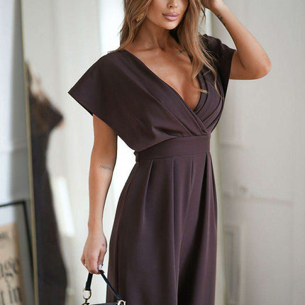 Chic Wide-Leg Jumpsuit with Flared Sleeves and Statement Belt - Très Elite