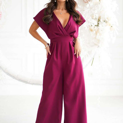 Chic Wide-Leg Jumpsuit with Flared Sleeves and Statement Belt - Très Elite