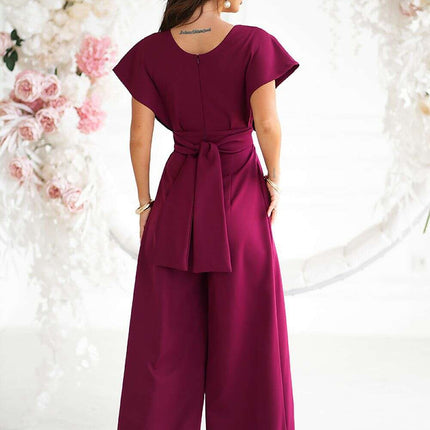 Chic Wide-Leg Jumpsuit with Flared Sleeves and Statement Belt - Très Elite