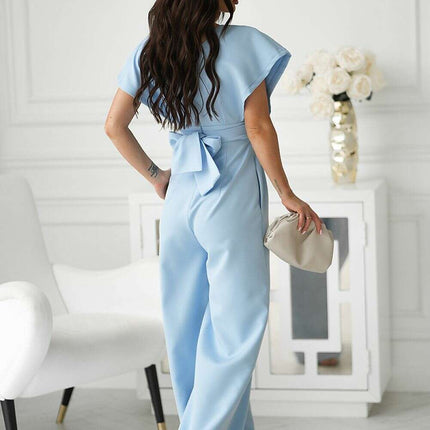 Chic Wide-Leg Jumpsuit with Flared Sleeves and Statement Belt - Très Elite