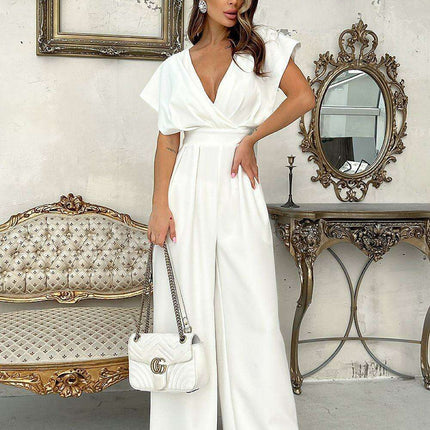 Chic Wide-Leg Jumpsuit with Flared Sleeves and Statement Belt - Très Elite
