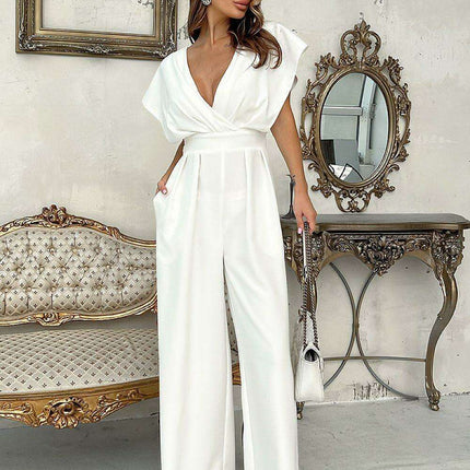 Chic Wide-Leg Jumpsuit with Flared Sleeves and Statement Belt - Très Elite