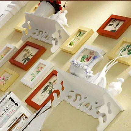 Elegant 13-Piece White Wood Carved Photo Frame Collection with Shelf Accents..