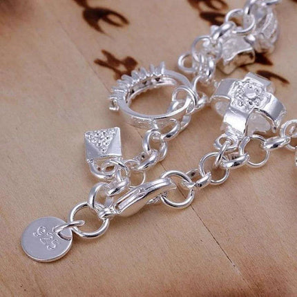 Elegant 925 Sterling Silver Heart Charm Bracelet - A Cherished Reminder of Love - Très Elite