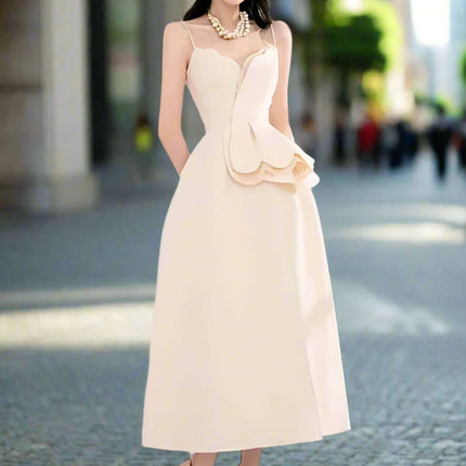 Elegant Apricot Velvet A-Line Slip Dress with Wave Hem Detail - Très Elite