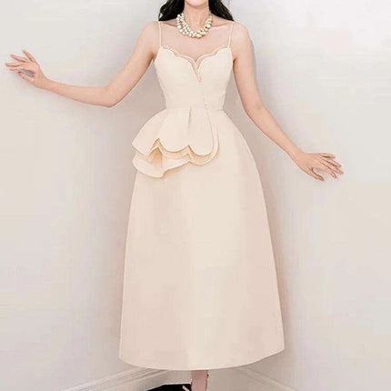 Elegant Apricot Velvet A-Line Slip Dress with Wave Hem Detail - Très Elite