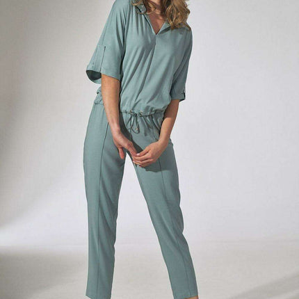 Elegant Beige Tapered Trousers with Stitched Edges and Elastic Waistband - Très Elite