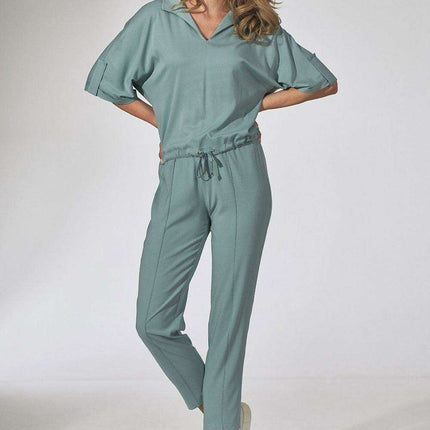 Elegant Beige Tapered Trousers with Stitched Edges and Elastic Waistband - Très Elite