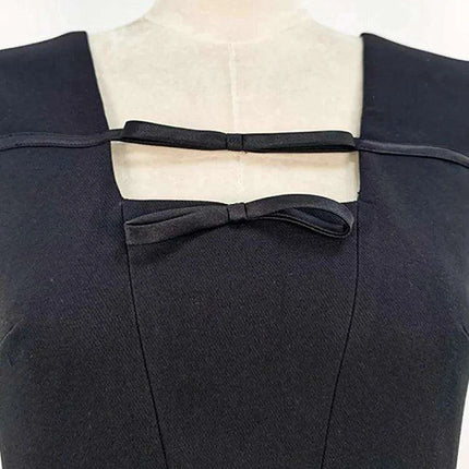 Elegant Black Sleeveless Evening Dress with Bow Detail and High Slit - Très Elite